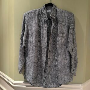 Robert Stock animal print size medium 100% silk with padded shoulders blouse